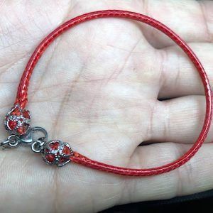 Pulsera Roja y acero de la protección en Madrid PRAS1
