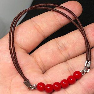 Pulsera de goma extensible con bolitas rojas en Madrid PBR1B
